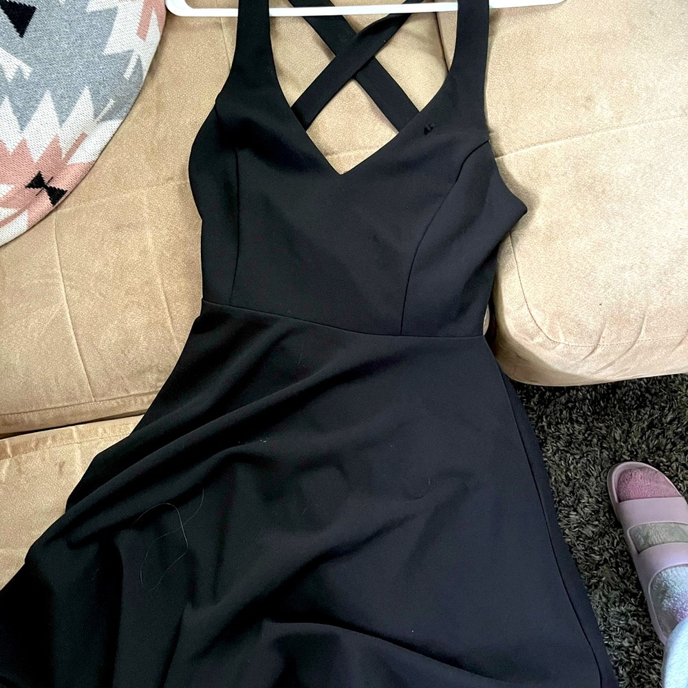 Lulus mini black dress with deep V neck